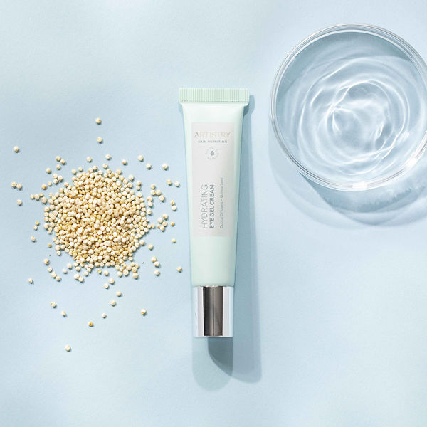 Hydrating Eye Gel Cream with Quinoa Seed on Blue Background Artistry Skin Nutrition Stylized Product and Ingredient Photography